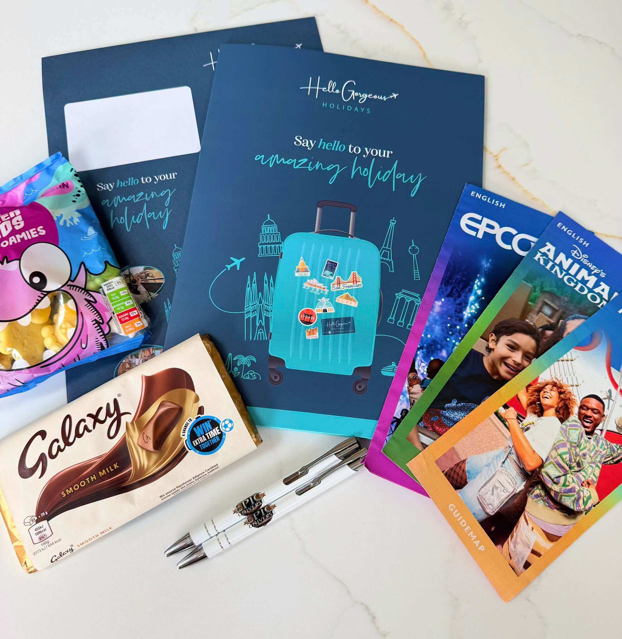 Hello Gorgeous Holidays travel documents and treats